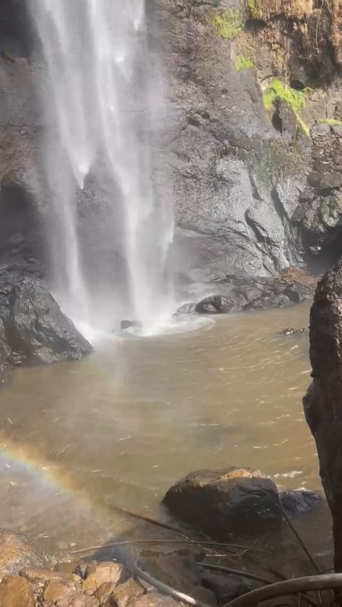 The base of the falls, a rainbow in the spray